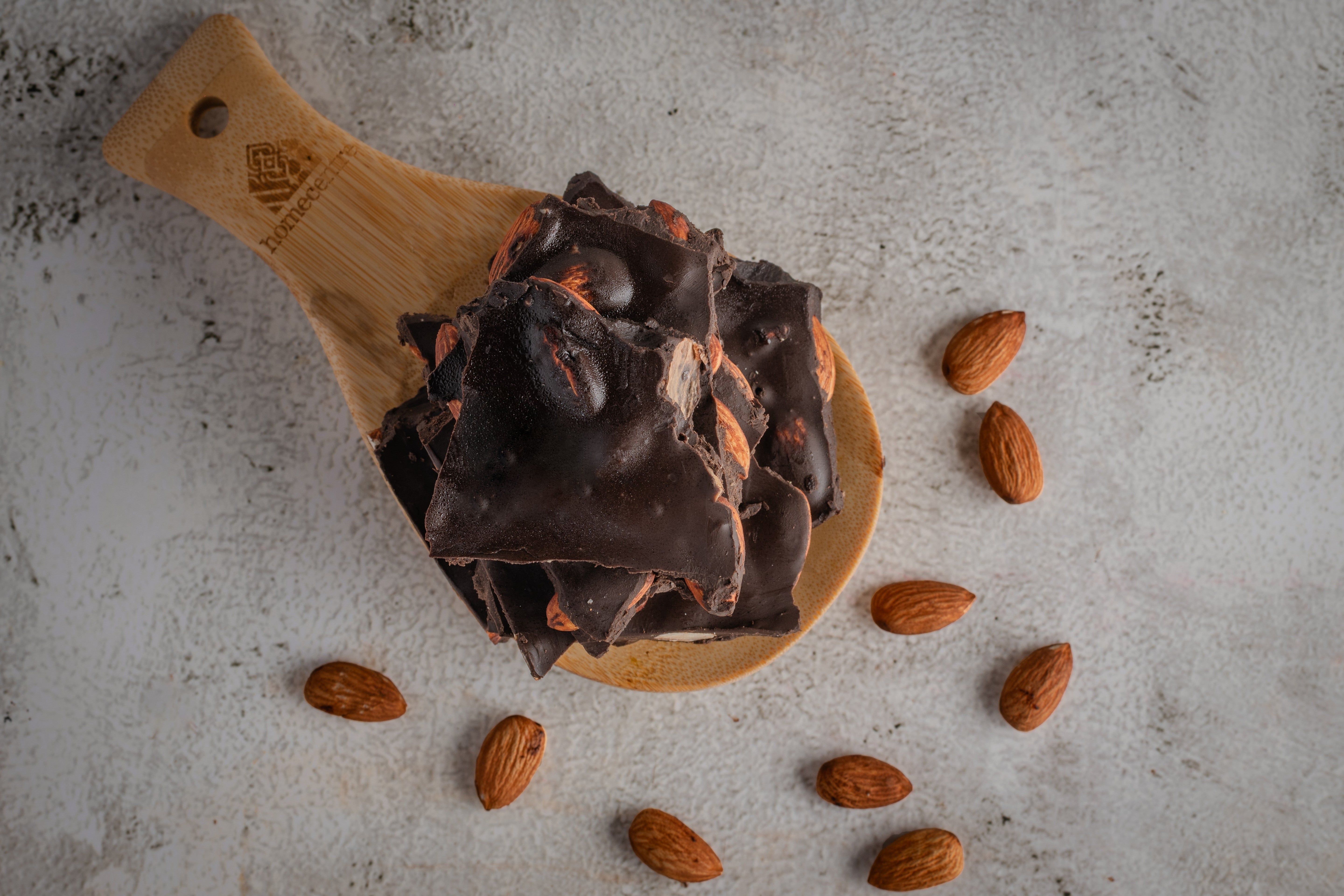 Buy chocolate covered almonds and dark chocolate almonds—crafted by World of Mysore Pak, ready online.