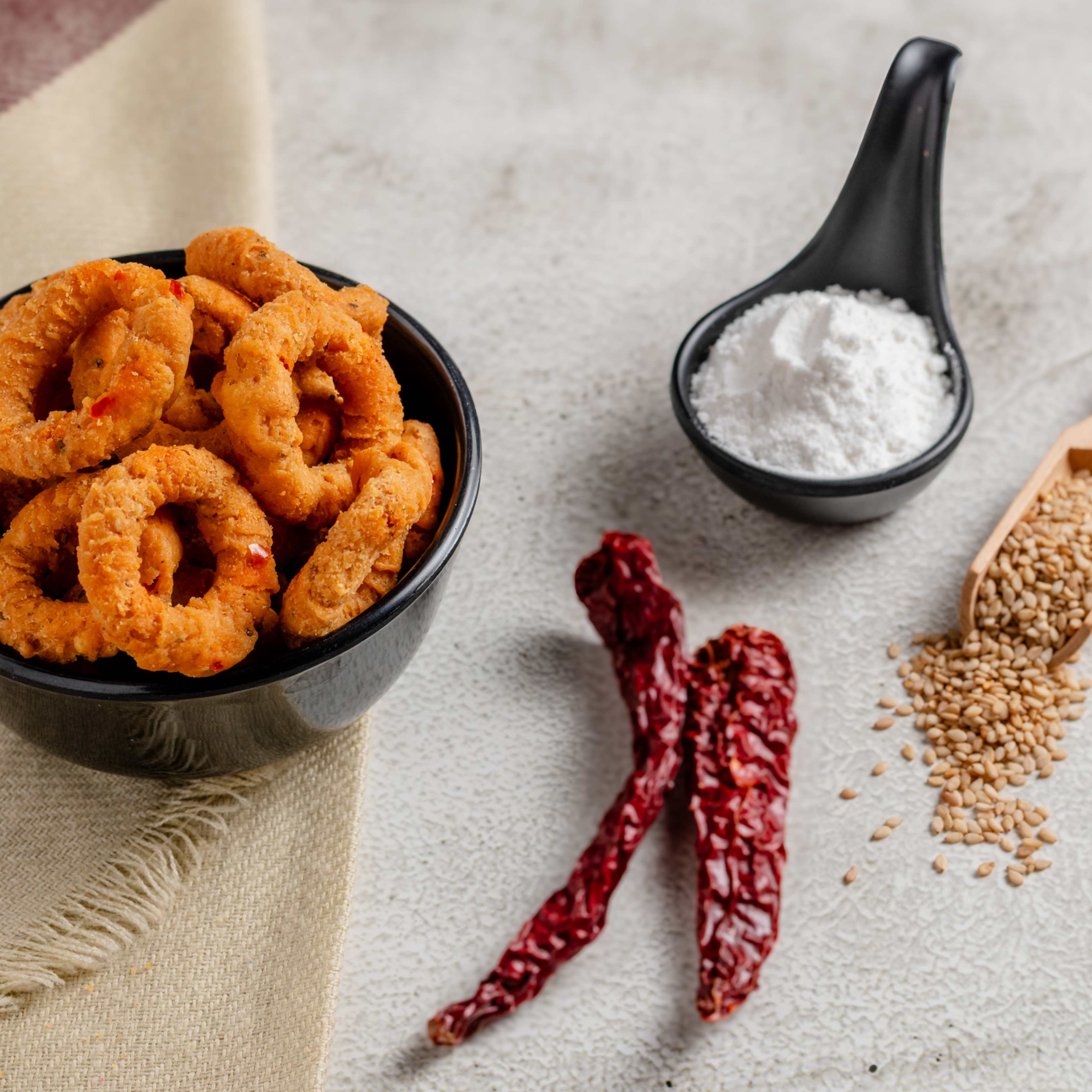 Buy Andhra Muruku online from World of Mysore Pak. A bold, crunchy snack with traditional spices like cumin and sesame.