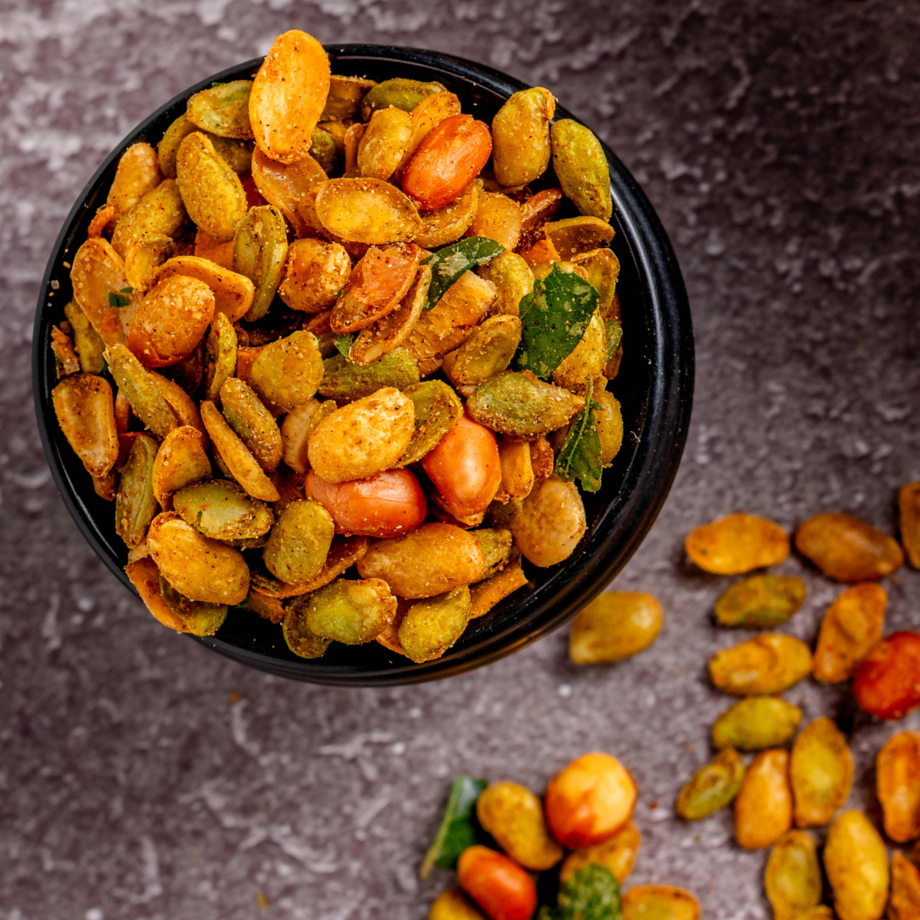 Buy Avarekalu Mixture online from World of Mysore Pak – crispy avarekalu with peanuts and curry leaves.