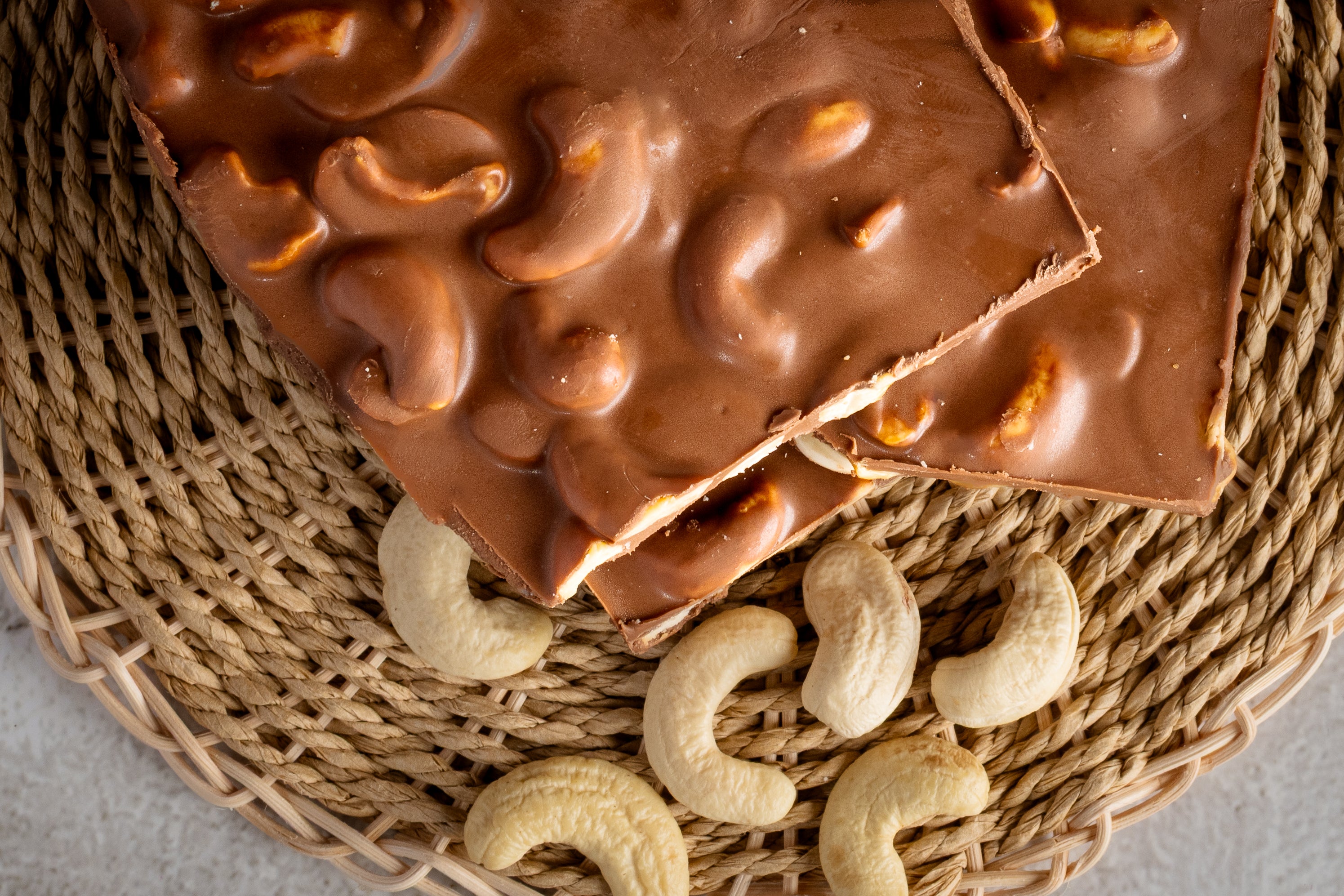 Buy Cashew Milk chocolate for silky sweetness and flavor—get it fresh online via World of Mysore Pak