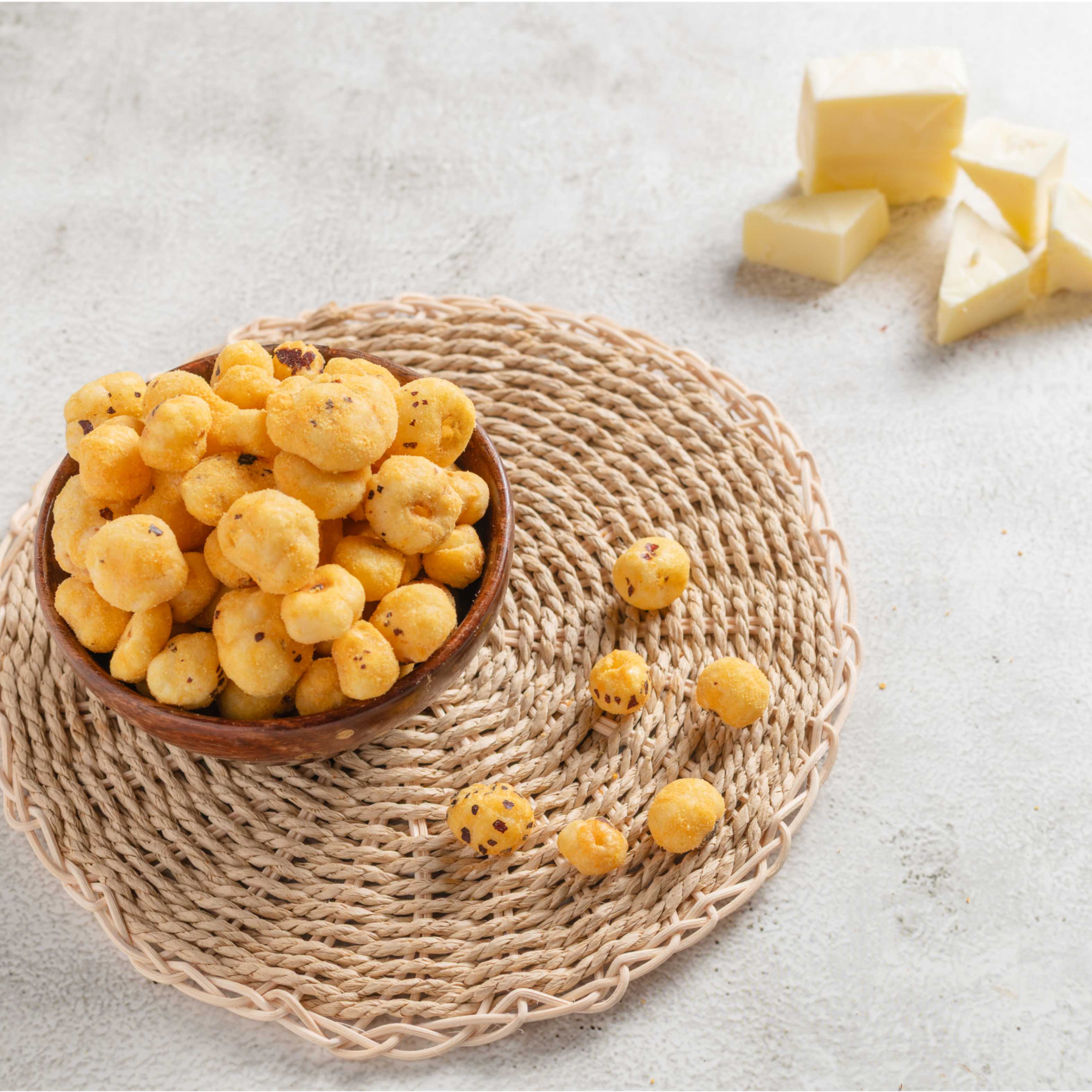 Buy Cheddar Cheese Makhana online from World of Mysore Pak. These crispy fox nuts are packed with bold cheese flavor.
