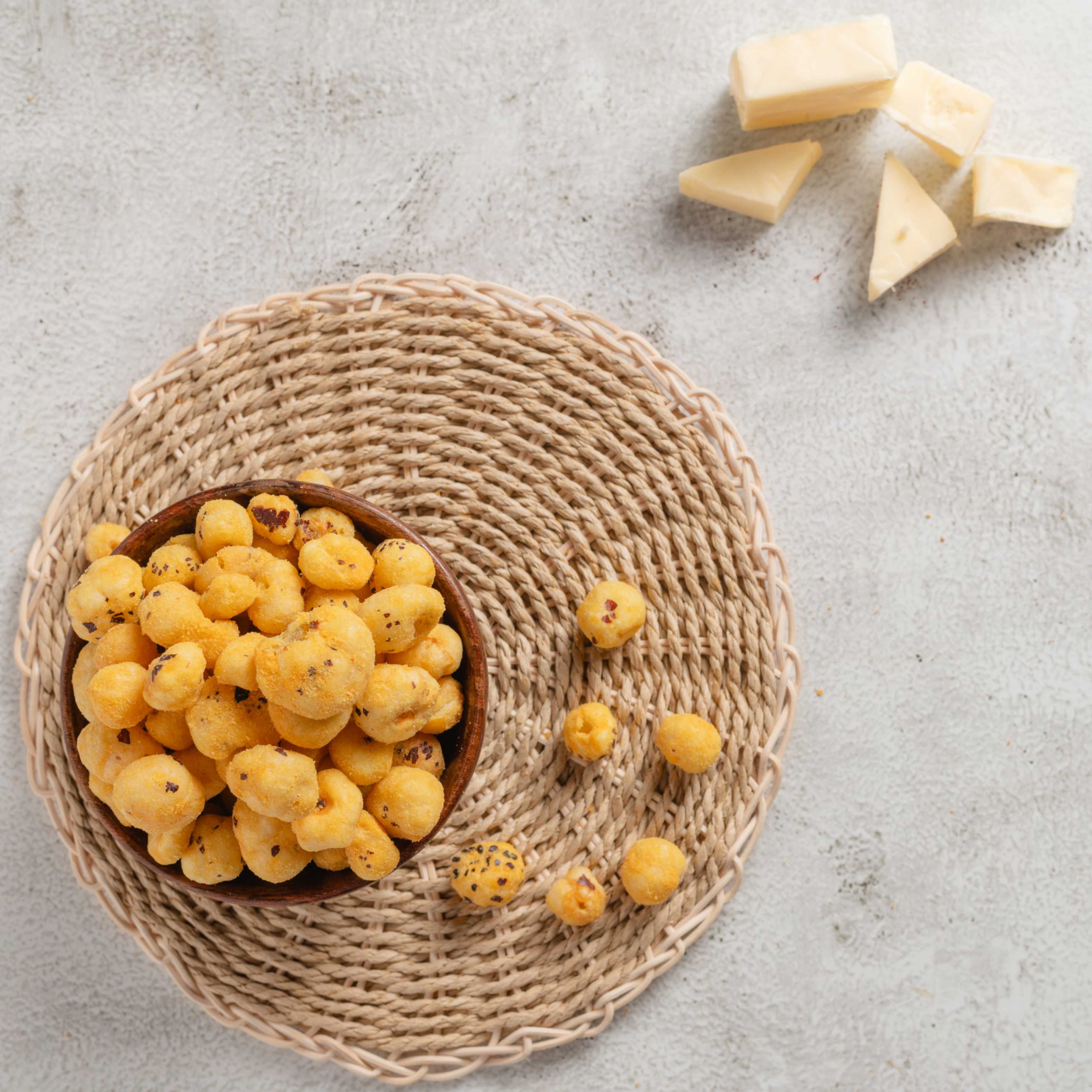 Buy Cheese Makhana online from World of Mysore Pak. A crunchy, melt-in-your-mouth snack with rich cheddar cheese.