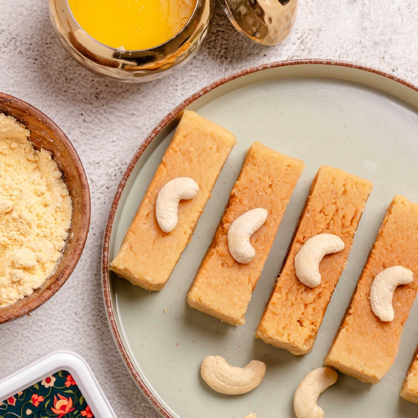 Buy Kaju Mysore Pak online from World of Mysore Pak – fresh cashew sweet with ghee & melt-in-mouth texture.
