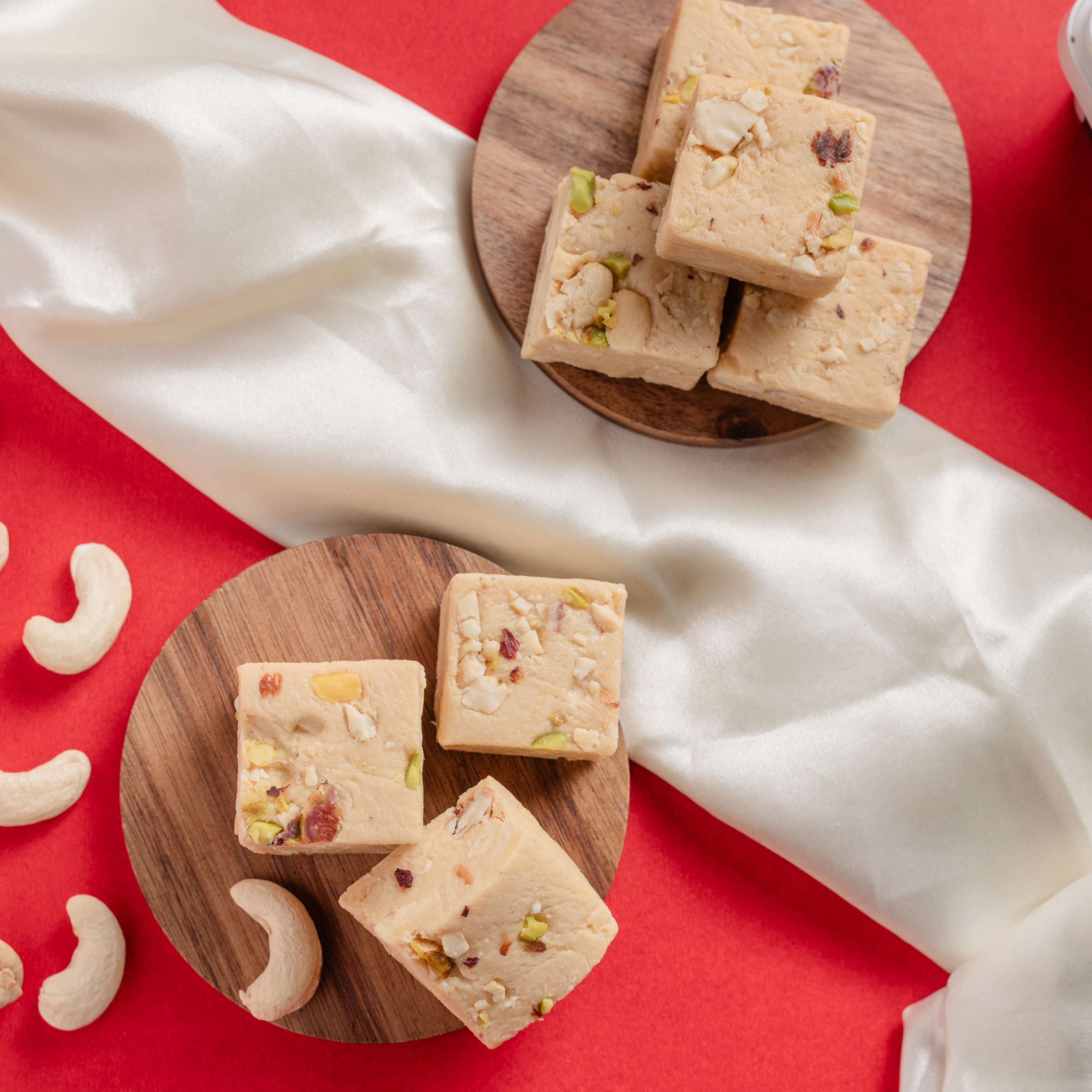 Buy Kaju Bites sweets online. Kaju bites made with cashew 100%  ghee and sugar for a crunchy experience.