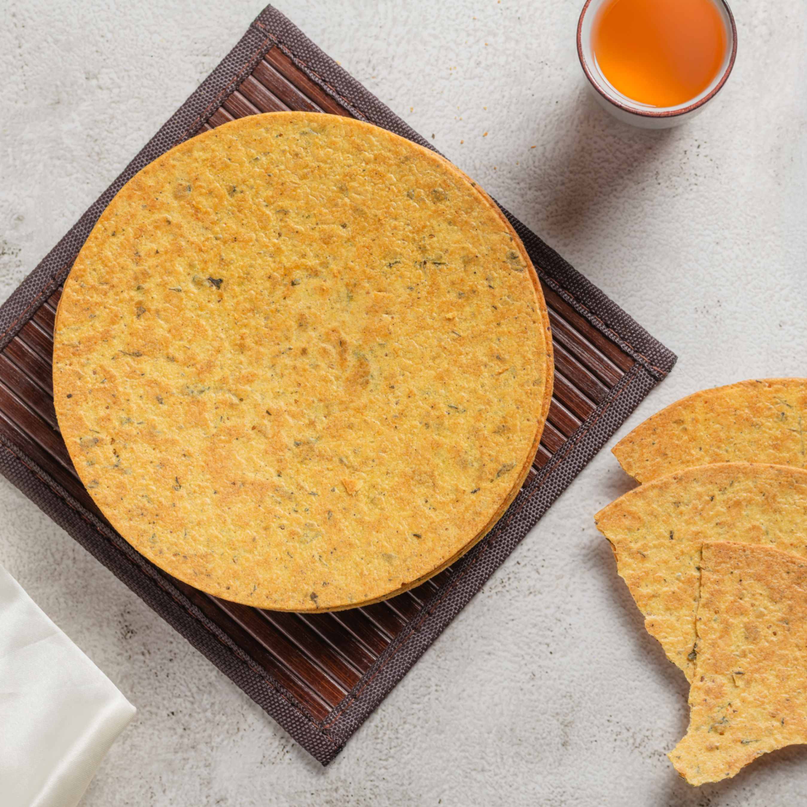 Buy Methi Khakhra online from World of Mysore Pak – crisp whole wheat snack with methi masala for guilt-free munching.