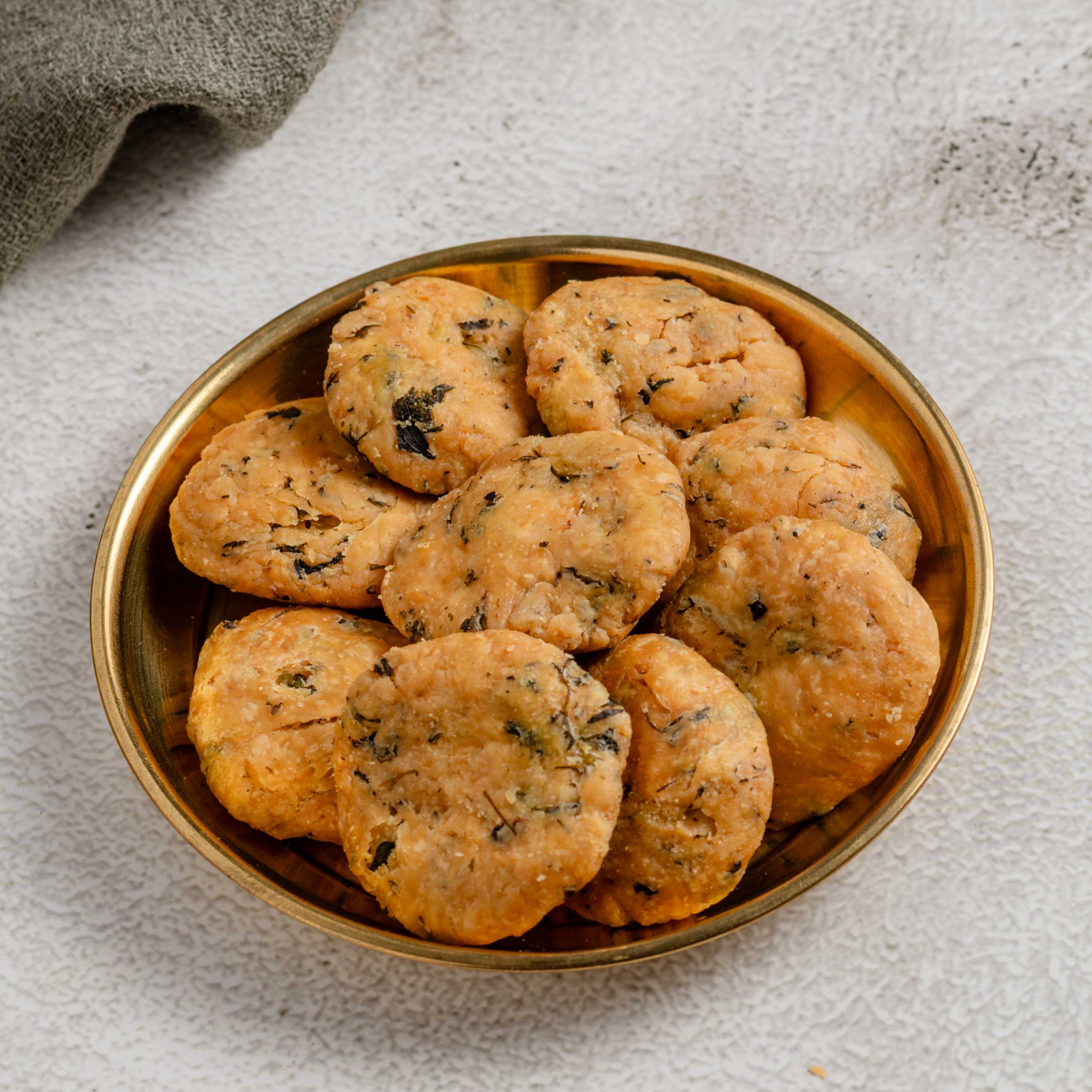Buy Methi Matri online from World of Mysore Pak – crispy, spiced snack with methi leaves and perfect deep-fried crunch.