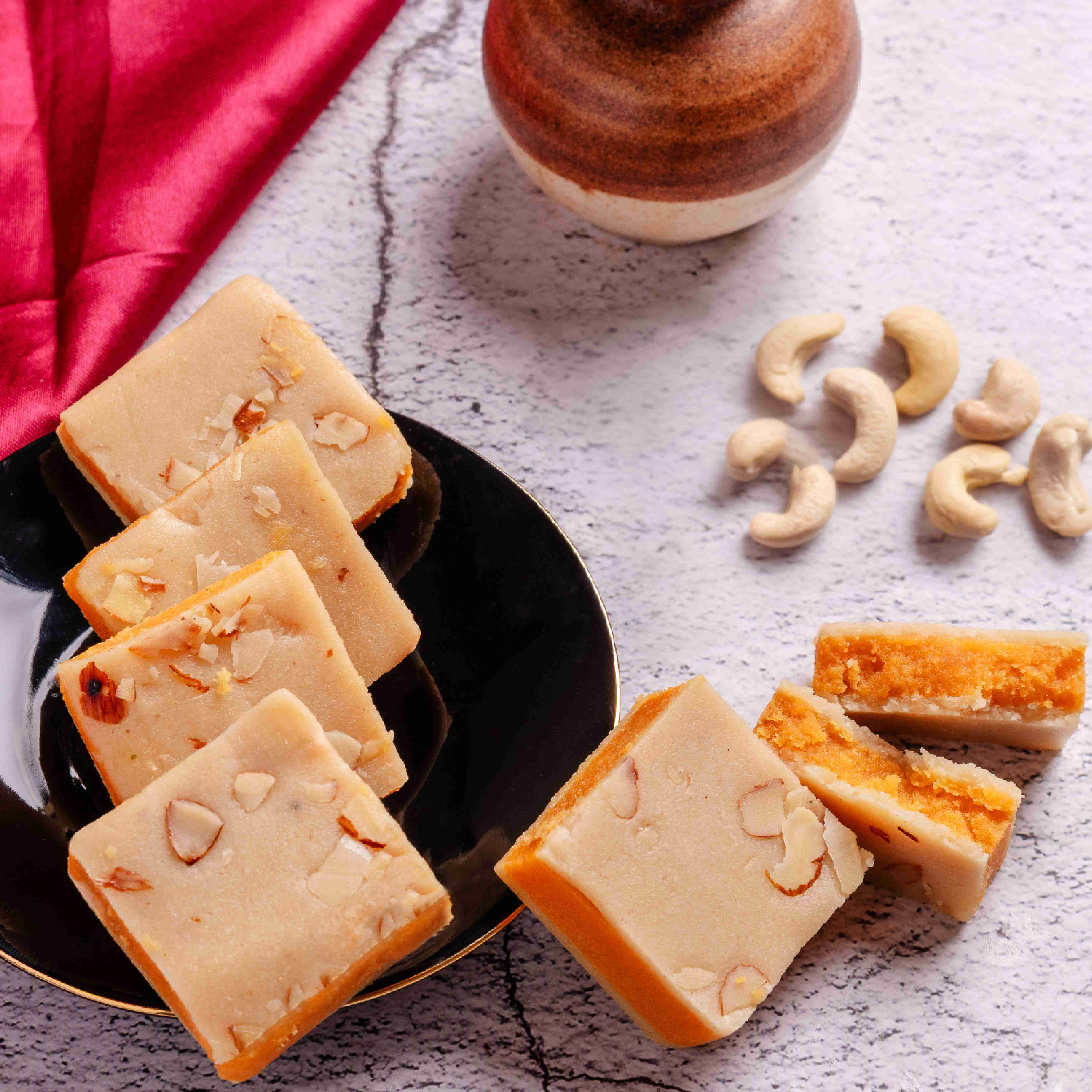 Buy Pa Ka Sandwich sweet online from World of Mysore Pak – a festive fusion of cashew and Mysore Pak made with pure ghee.