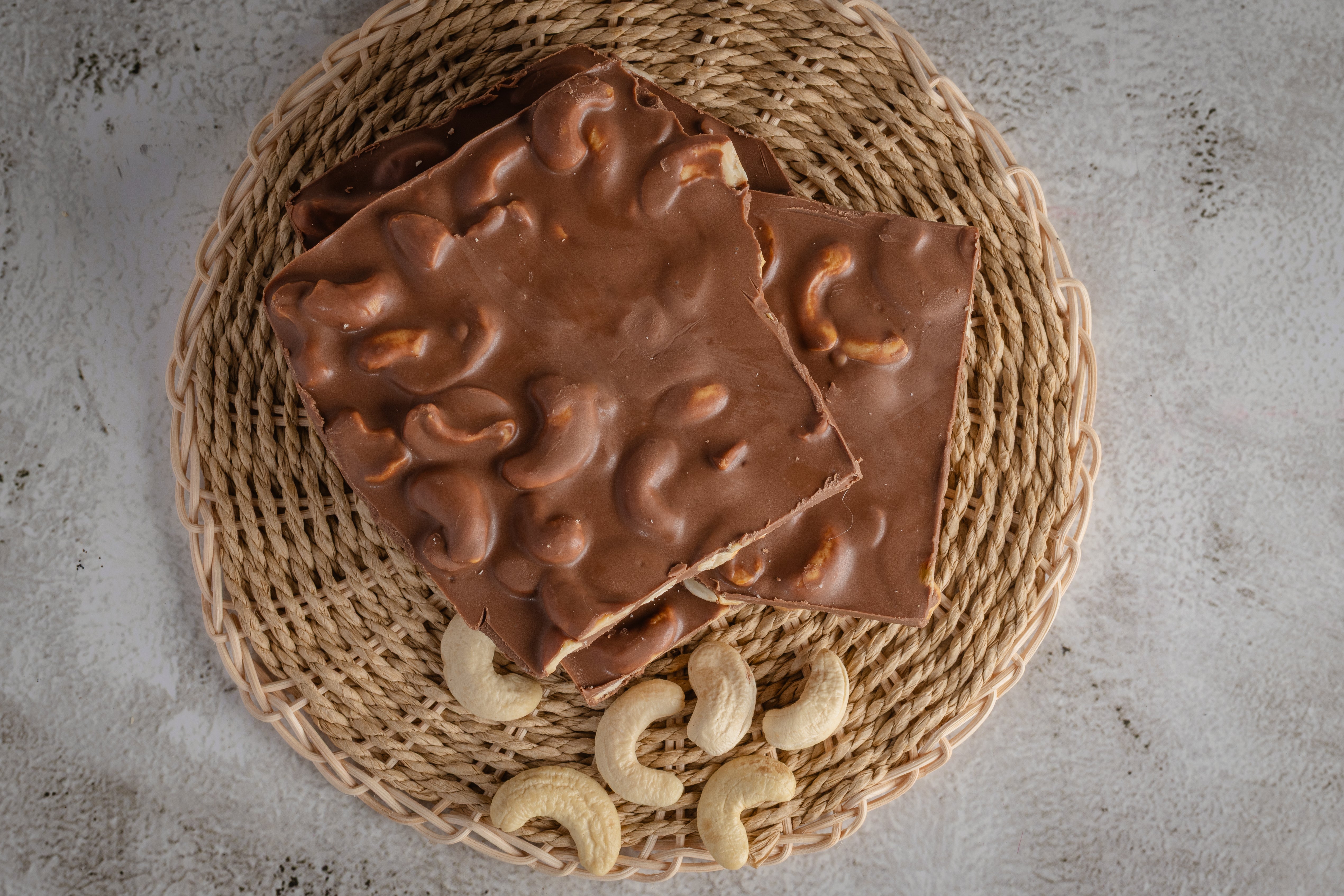 Buy Kaju Chocolate bars for a smooth and nutty experience—delivered online from World of Mysore Pak.