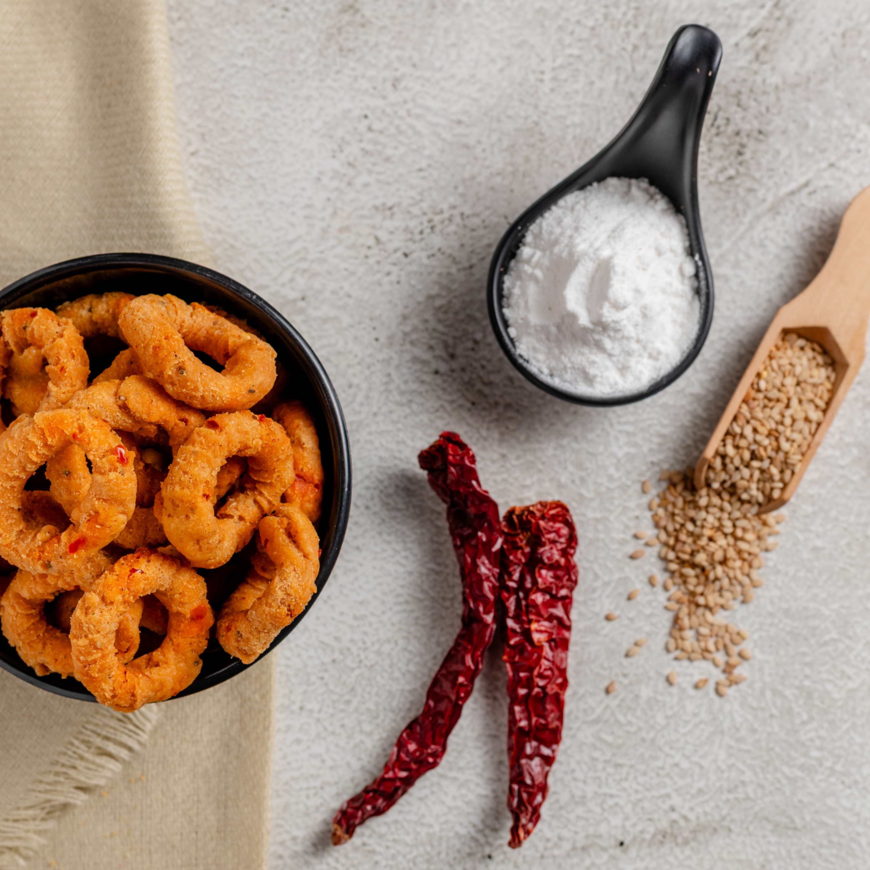 Buy Andhra snacks online from World of Mysore Pak – spicy rice flour murukku with urad dal, perfect for tea time crunch.